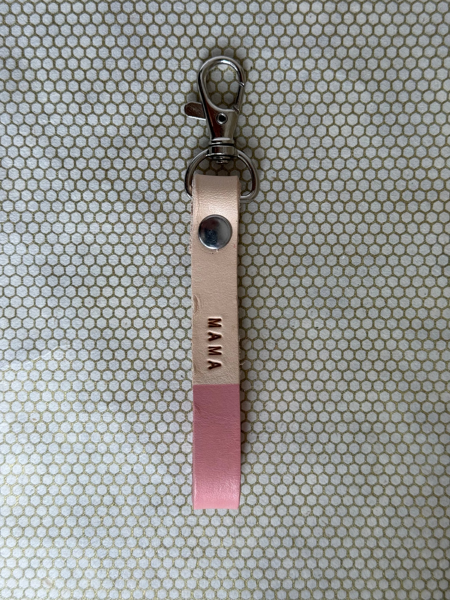 pink color keychains with leather straps and "mama" lettering on leather.