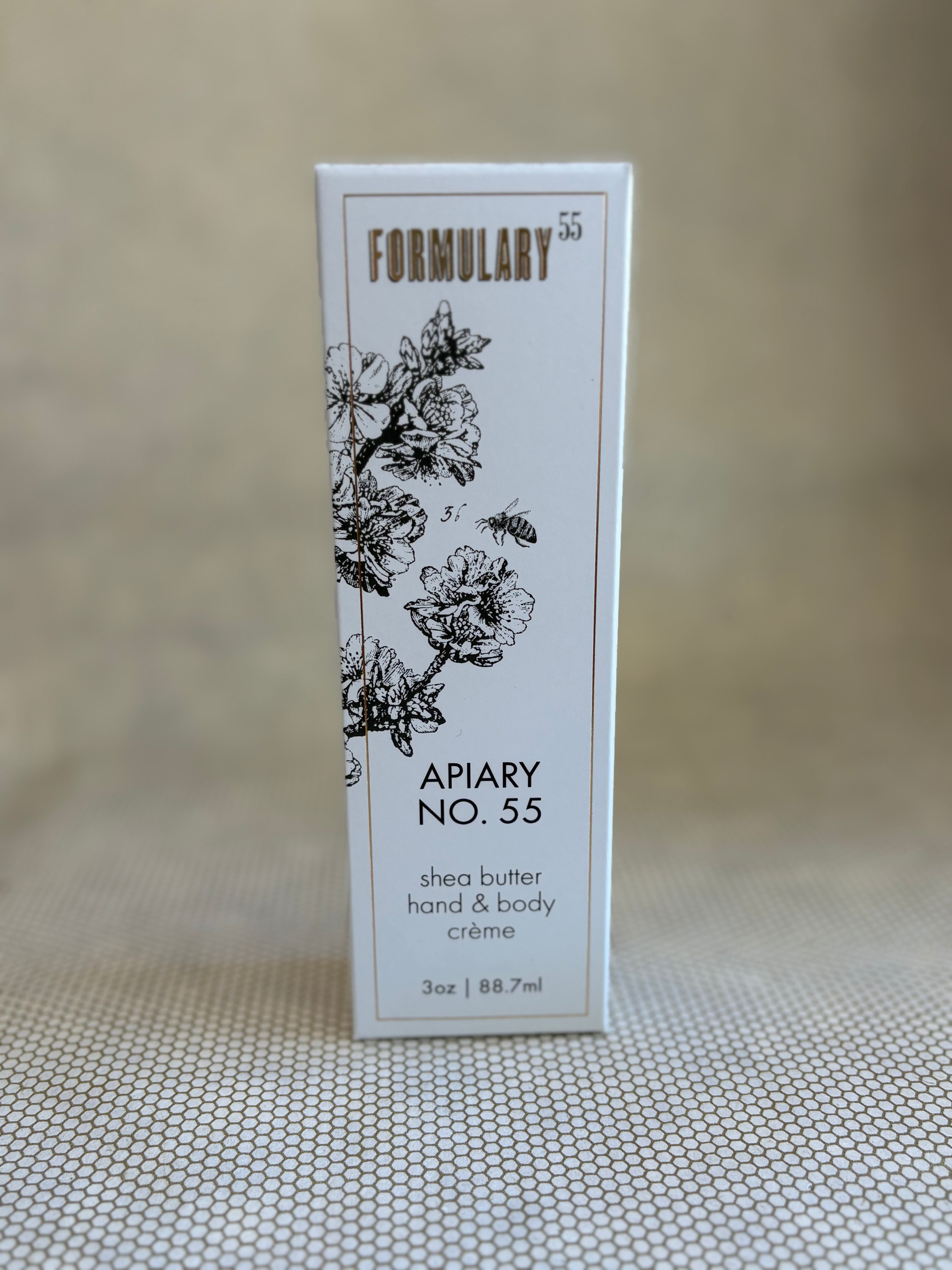 Box of Formulary 55 apiary hand and body lotion on a neutral background