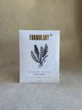 Formulary 55 eucalyptus and peppermint Sea Mineral foot soak in white packaging with black floral graphic. 