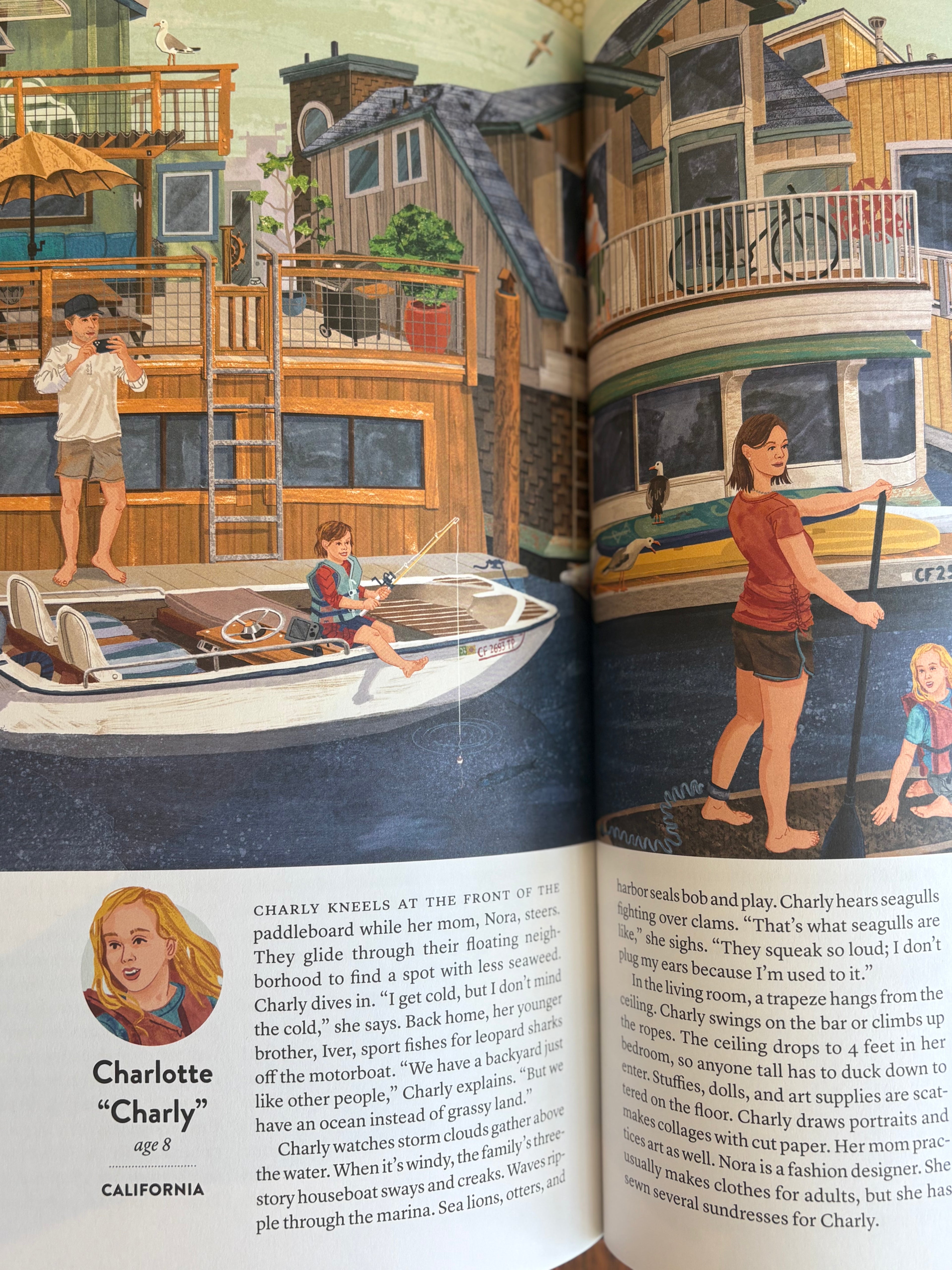 Illustrated book open to a page with children by a boat and a woman paddling.
