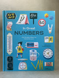 Book titled 'In Great Numbers' with various illustrations on a blue background