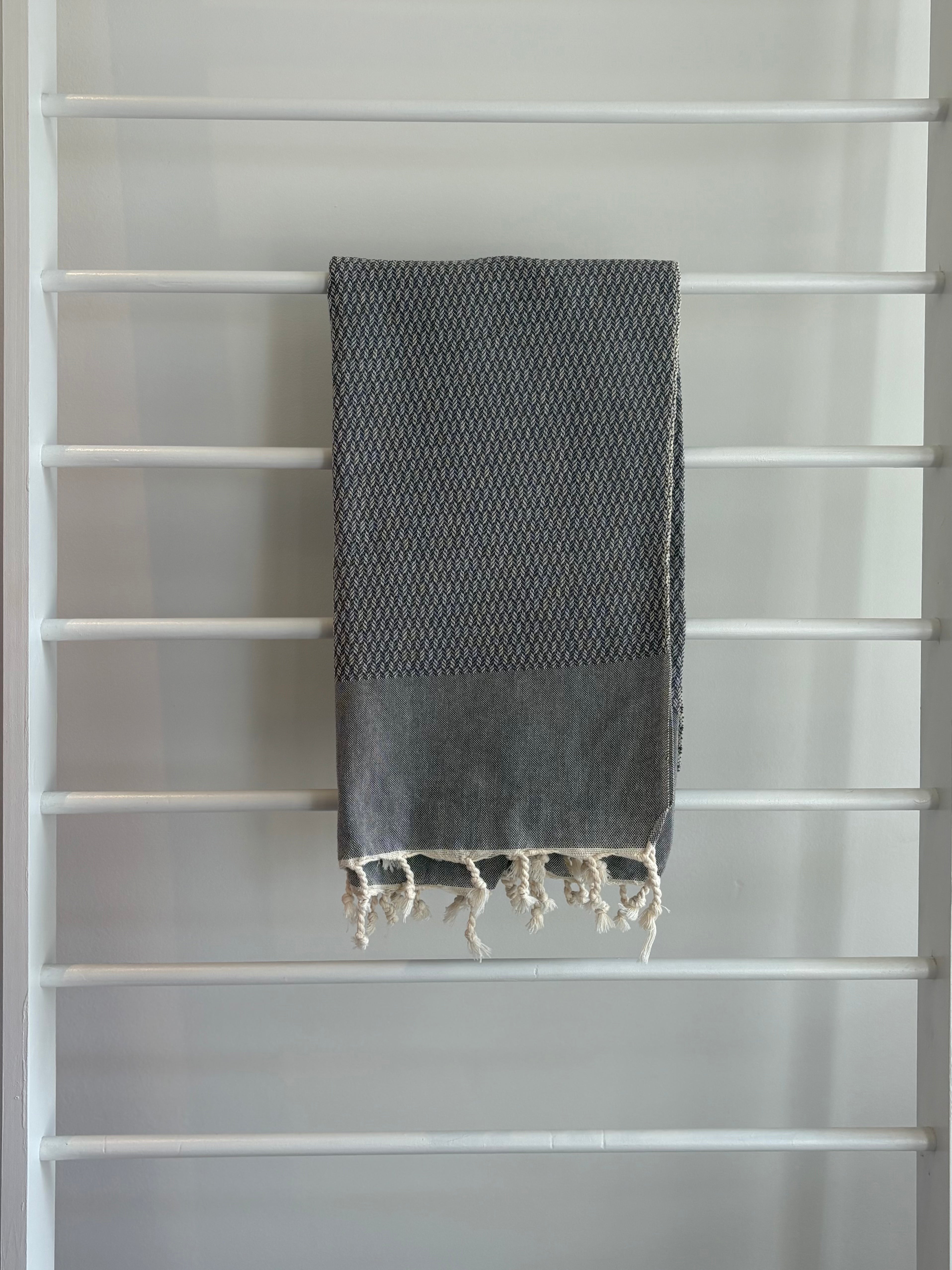  dark grey tweed weave towel. 