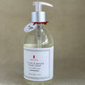 rue de marli glass liquid hand soap bottle with pump on neutral background. 