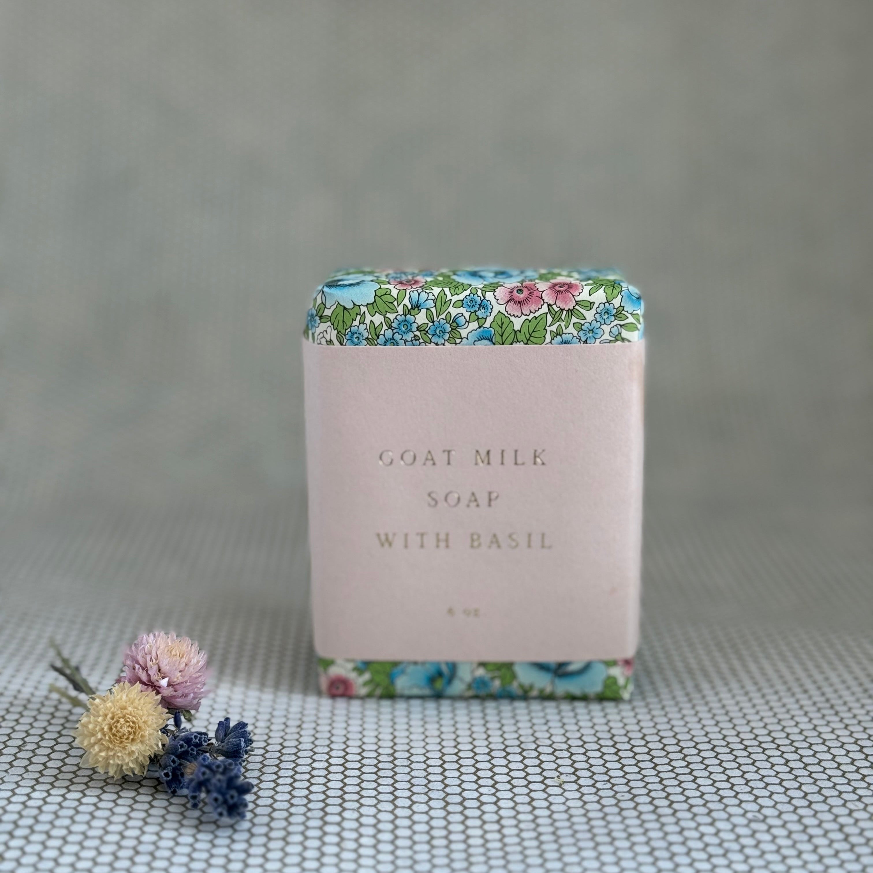 6oz bar soap in delicate blue green and pink floral and off-white paper wrapping. Saipua bar soap. 