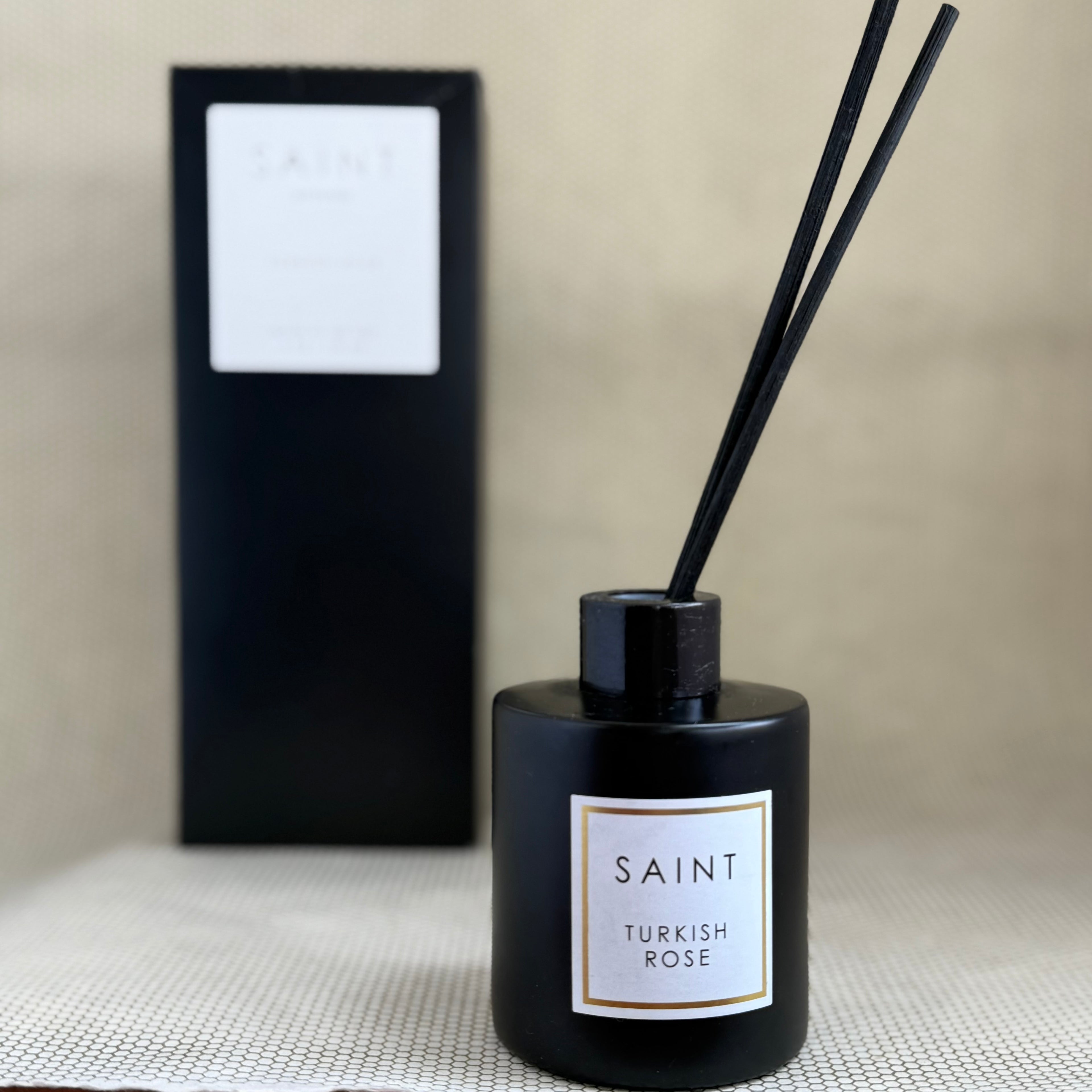 black reed diffuser bottle and black box. black diffuser wooden reed sticks. SAINT. turkish rose. 5oz (145mL)
