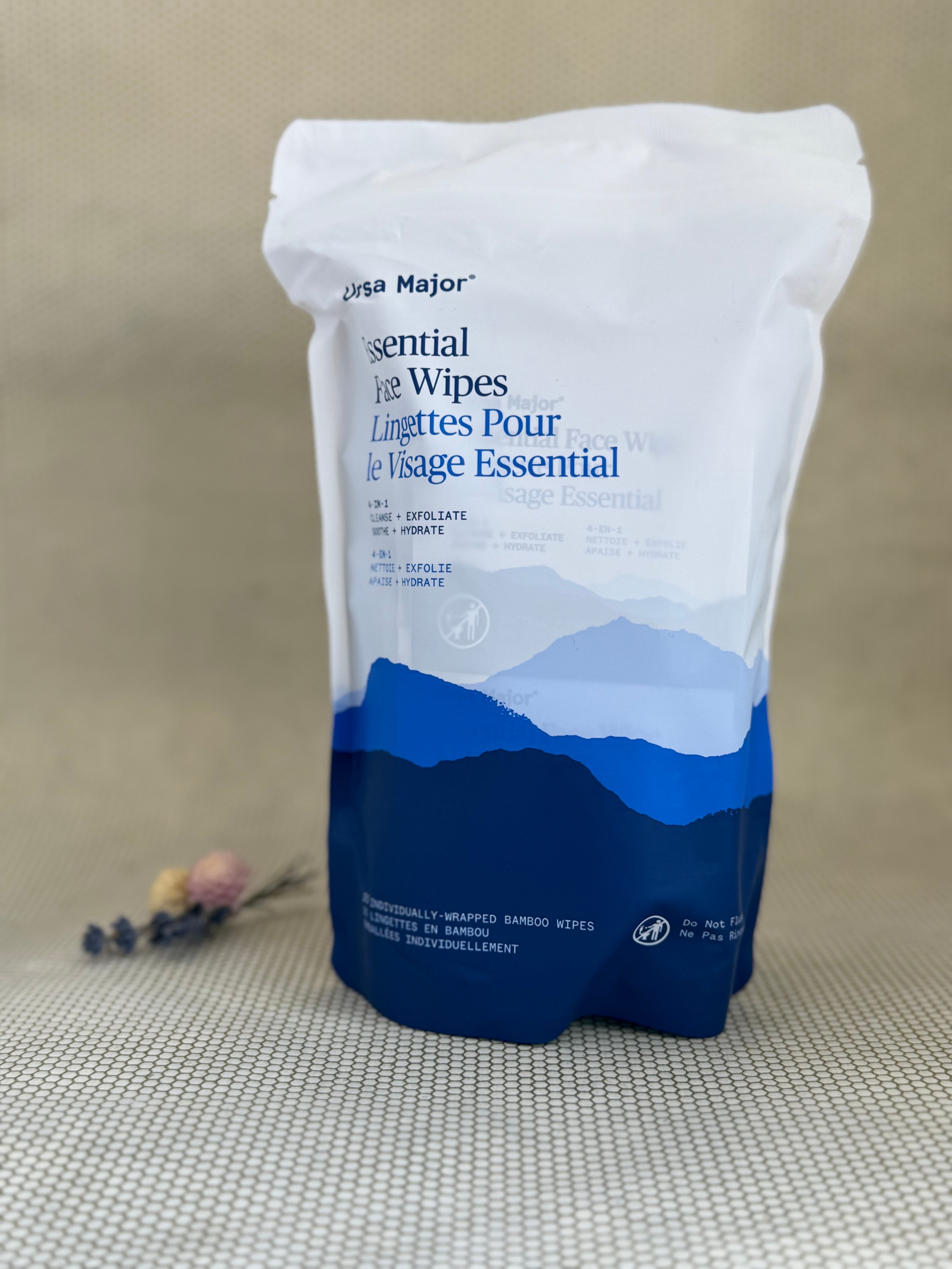Package of Ursa Major Essential Face Wipes with a mountain design on a neutral background