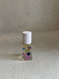 Maison Matine perfume with pink astronaut picture on glass bottle. 