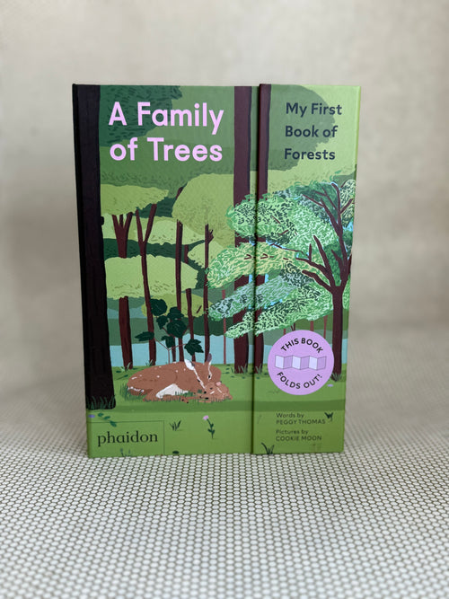 Book titled 'A Family of Trees' by Phaidon with graphics of forest trees and deer on a neutral background