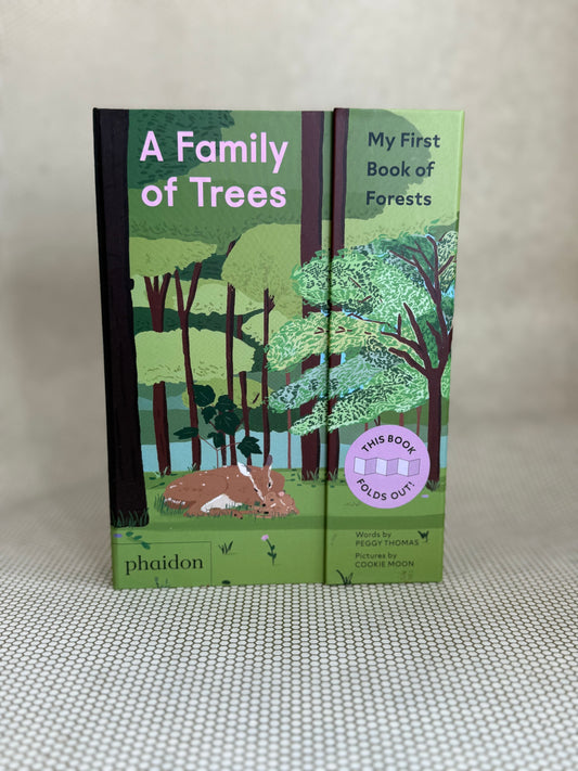 Book titled 'A Family of Trees' by Phaidon with graphics of forest trees and deer on a neutral background