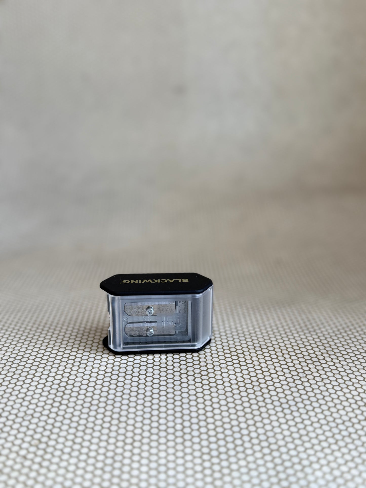 blackwing pencil sharpener on neutral background 