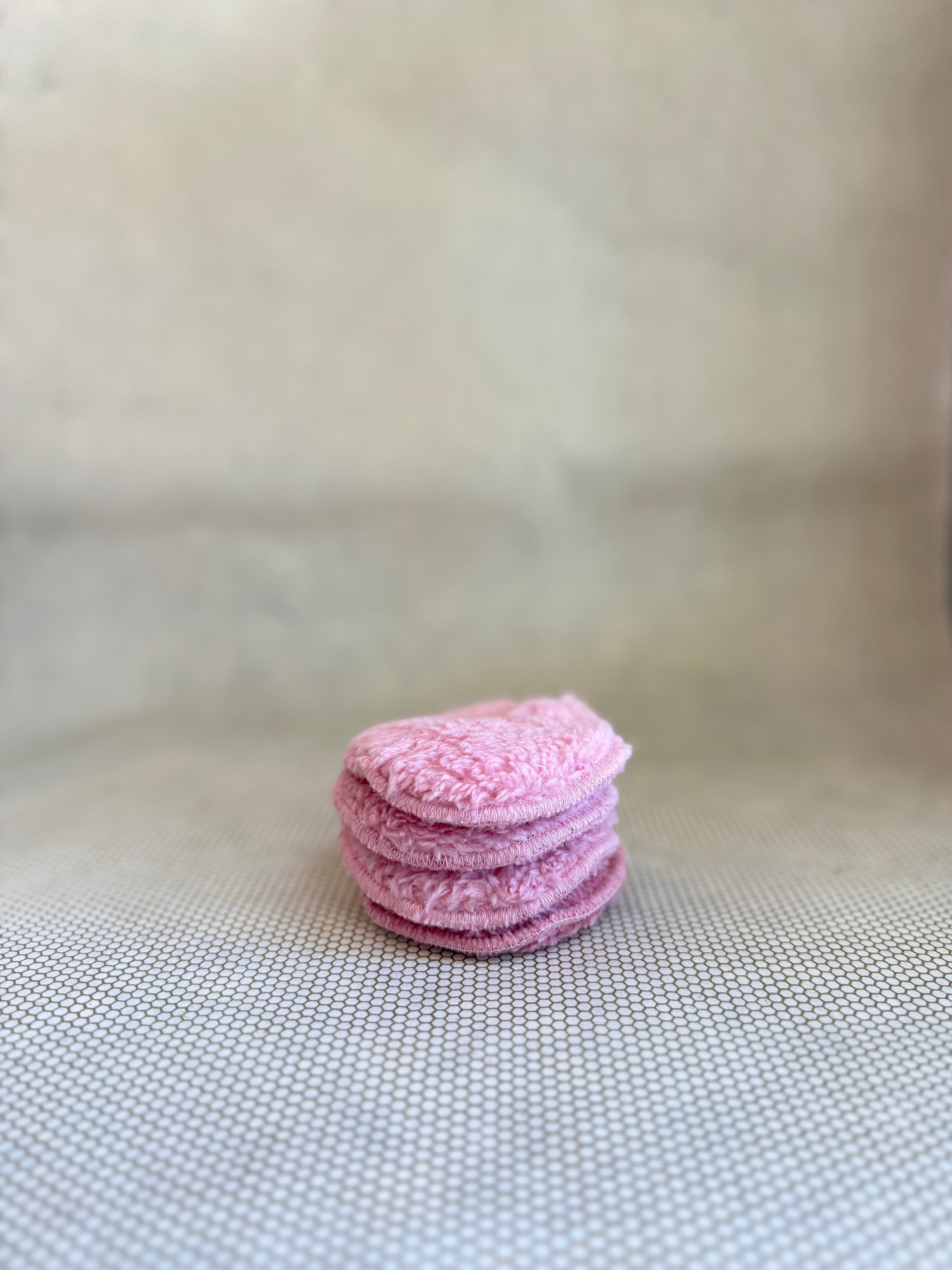 stack of Malou et Marius pink fluffy eye makeup remover pads. 