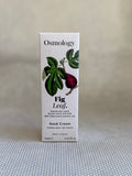 Osmology Fig Leaf hand cream packaging on a neutral background