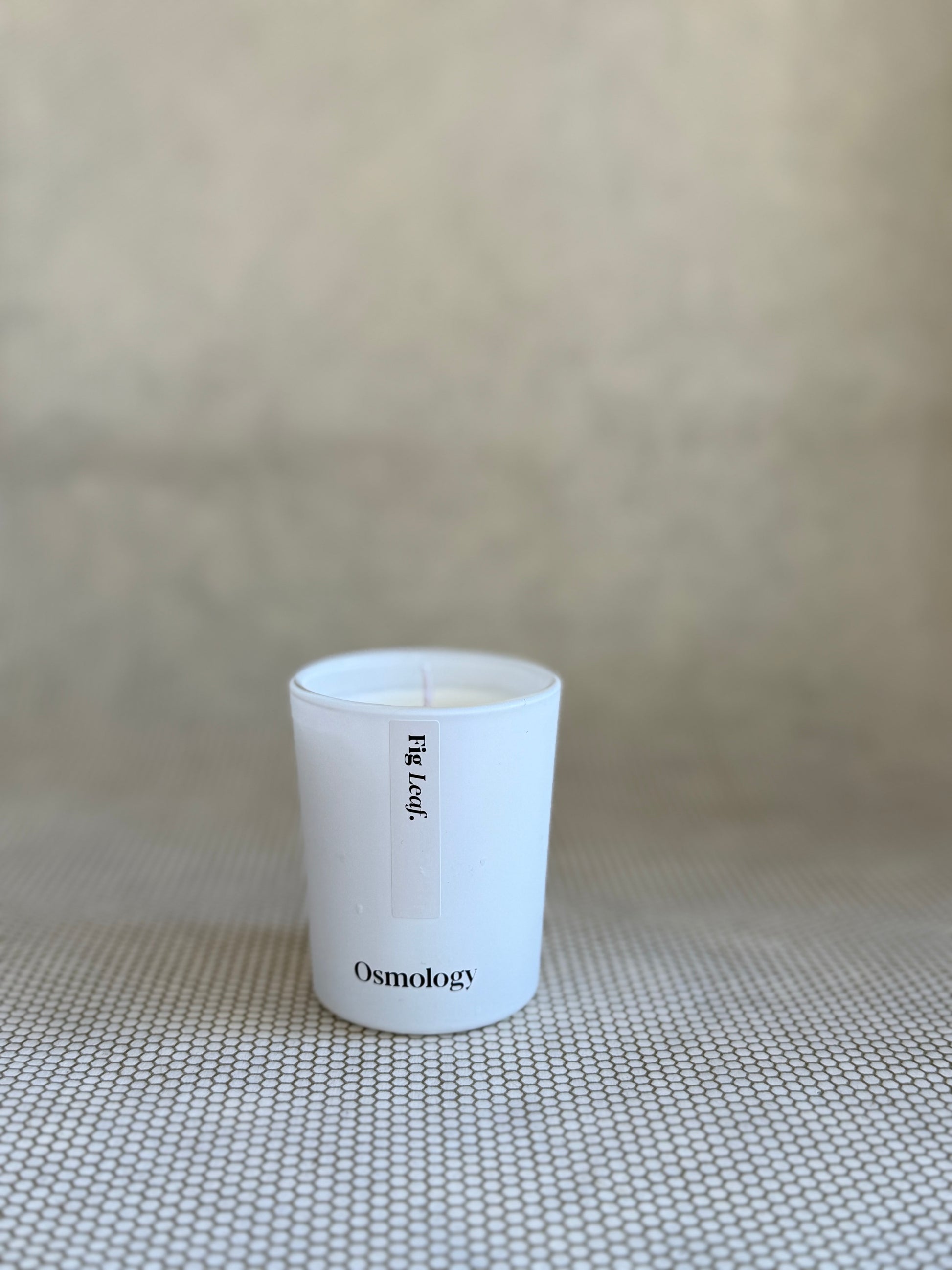 osmology fig leaf votive cande. 
100% Plant-Based Wax, Vegan, Cruelty-free Paraben-free Sulphate-free Phthalate-free Silicone-free.
2.8 oz