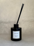 black reed diffuser bottle. black diffuser wooden reed sticks. SAINT. turkish rose. 5oz (145mL)