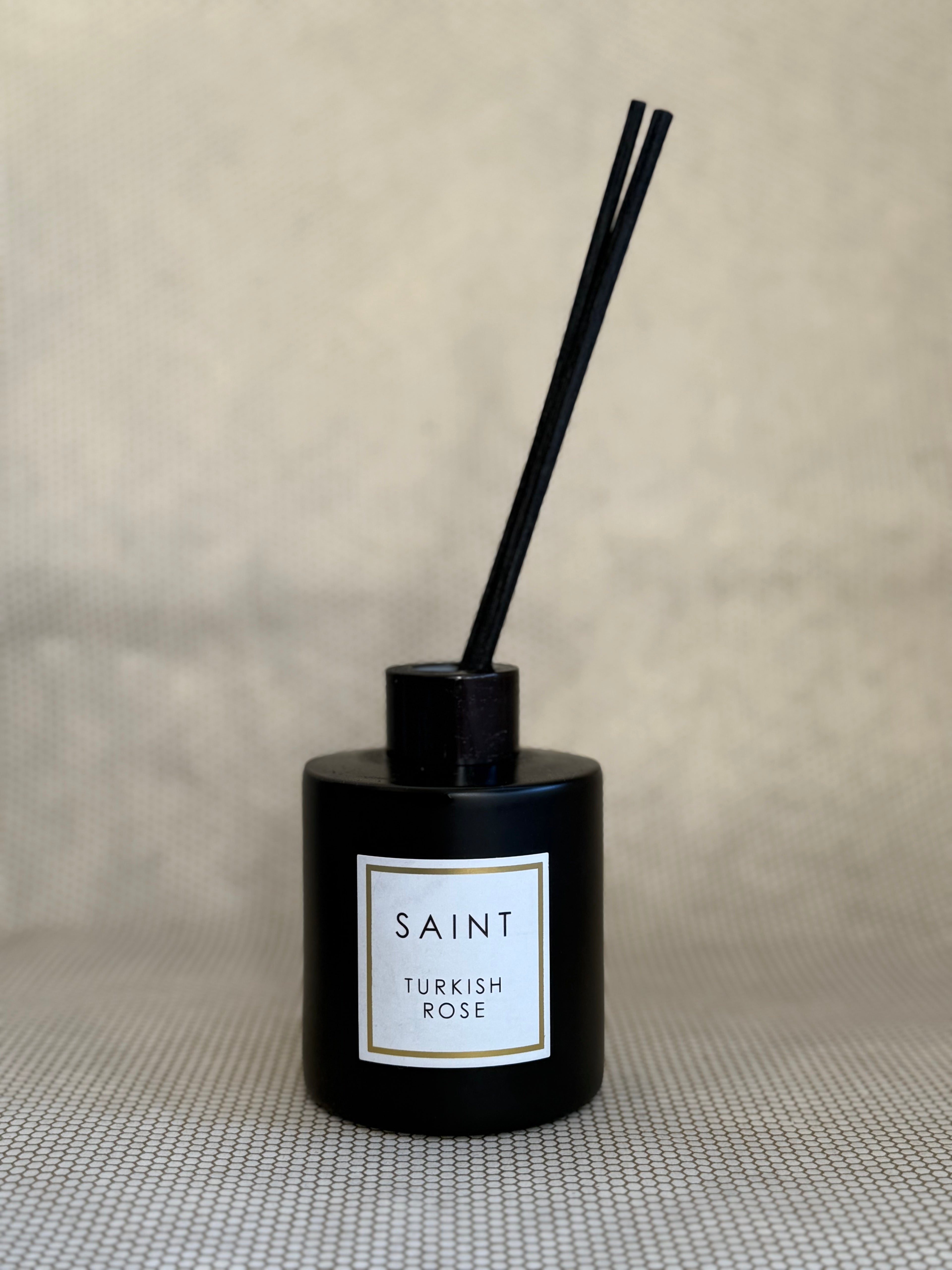 black reed diffuser bottle. black diffuser wooden reed sticks. SAINT. turkish rose. 5oz (145mL)