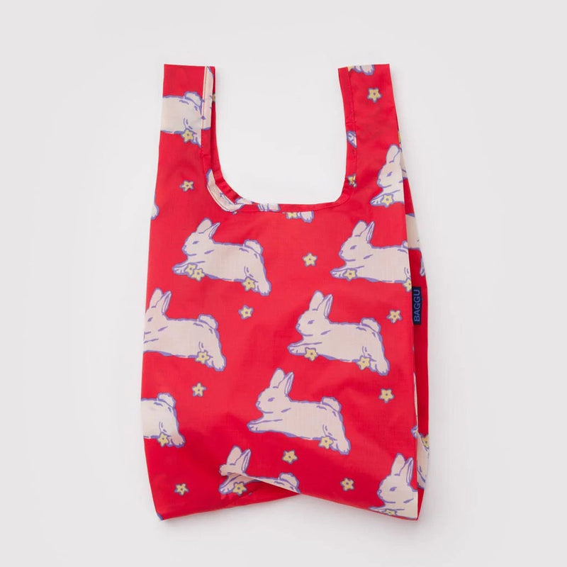 Red reusable Baggu bag with rabbit pattern on a white background